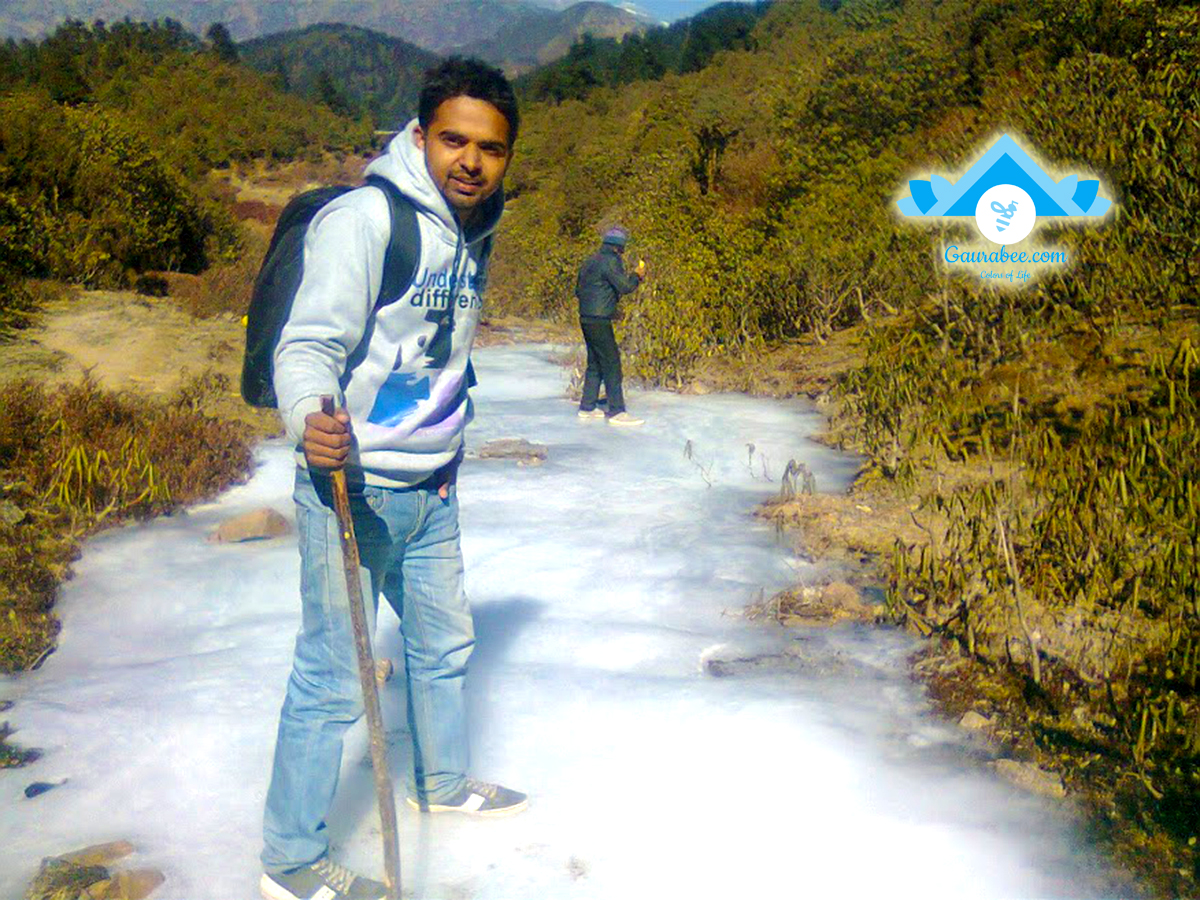 Travelers walking on frozen river