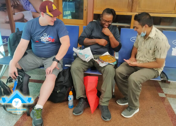 strangers playing baghchal at airport